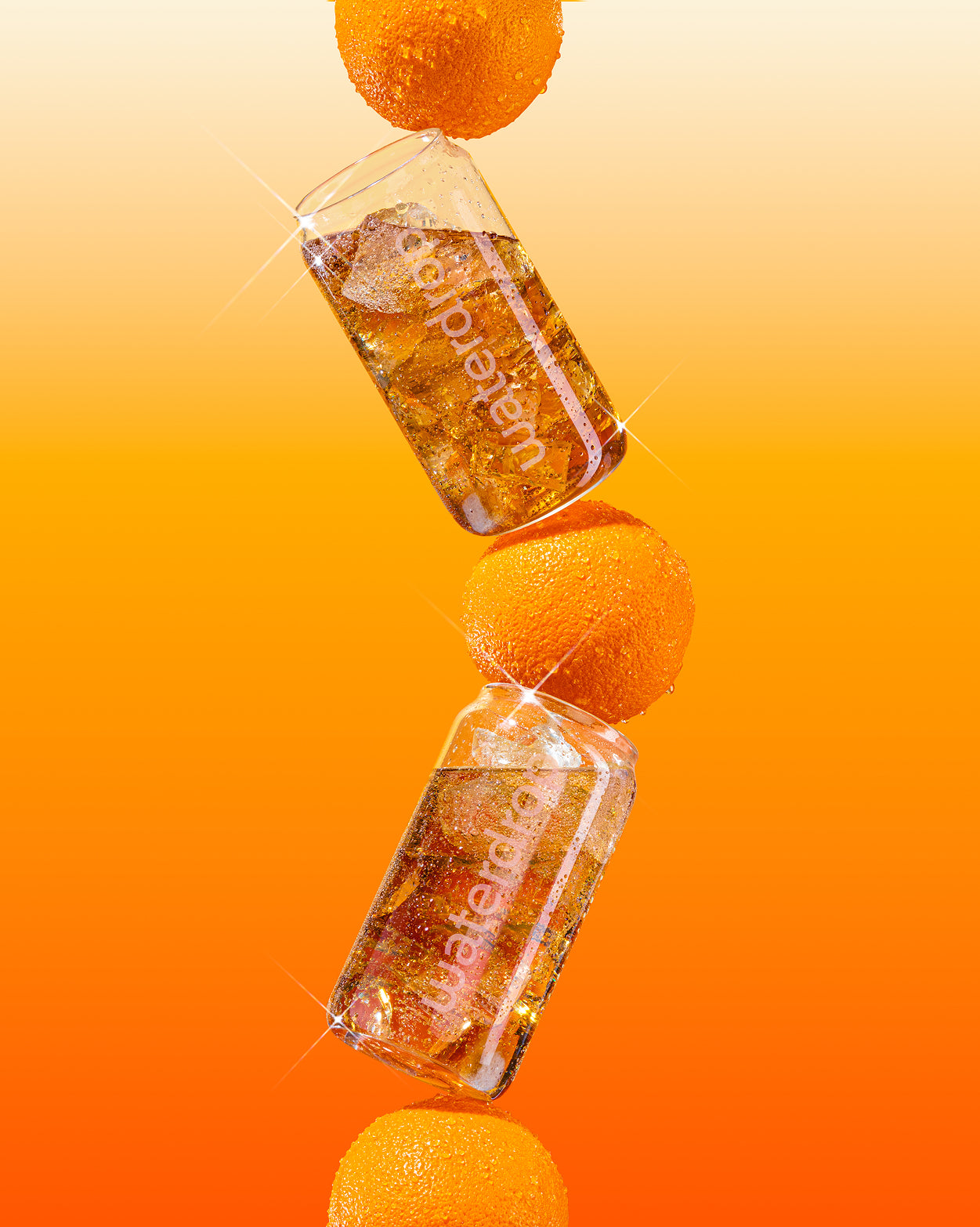 COLA ORANGE drinks with fresh oranges, branded waterdrop bottles.